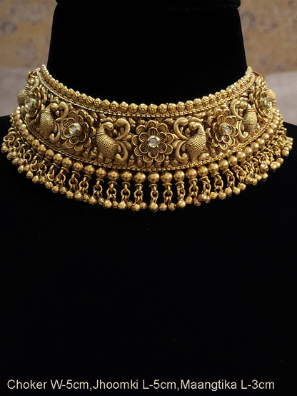 Intricate peacock and flower design with kundan choker setwith ghunghru hangings