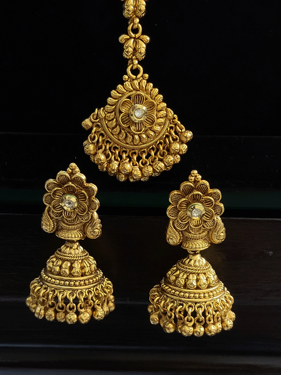 Intricate peacock and flower design with kundan choker setwith ghunghru hangings
