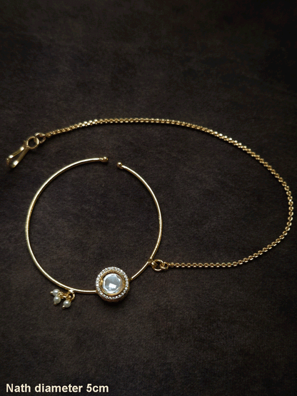 Round kundan with zircon detailing gold finish nath with pearly hangings