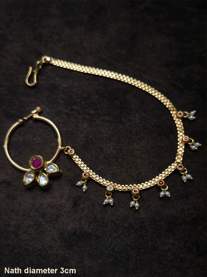 Circular stone with three leaf kundan flower nath with pearly hangings chain