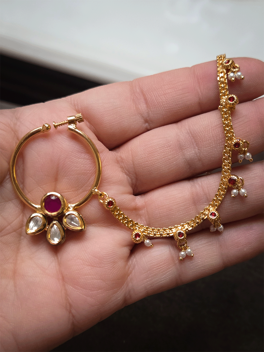 Circular stone with three leaf kundan flower nath with pearly hangings chain