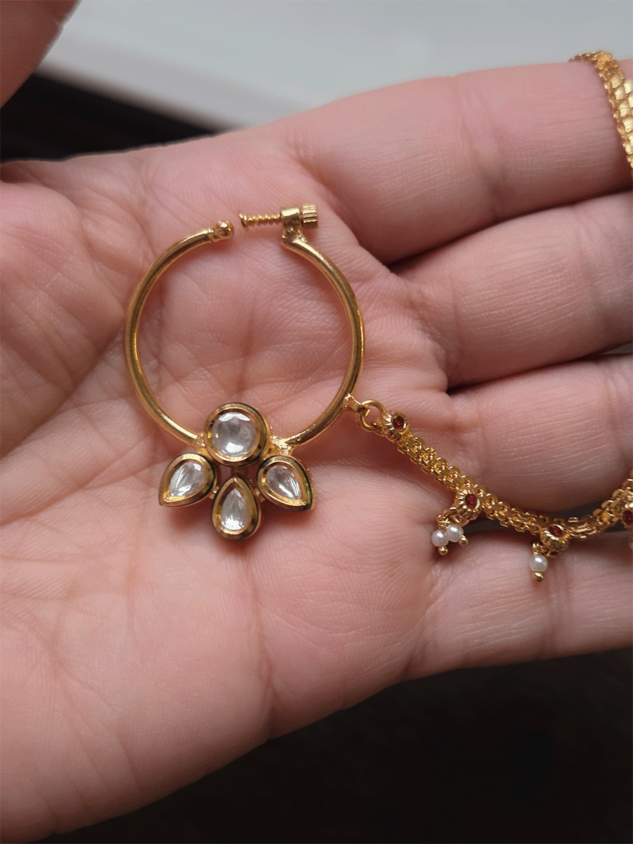 Circular stone with three leaf kundan flower nath with pearly hangings chain