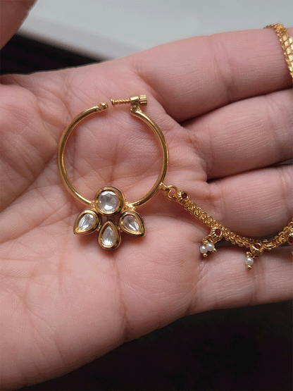 Circular stone with three leaf kundan flower nath with pearly hangings chain