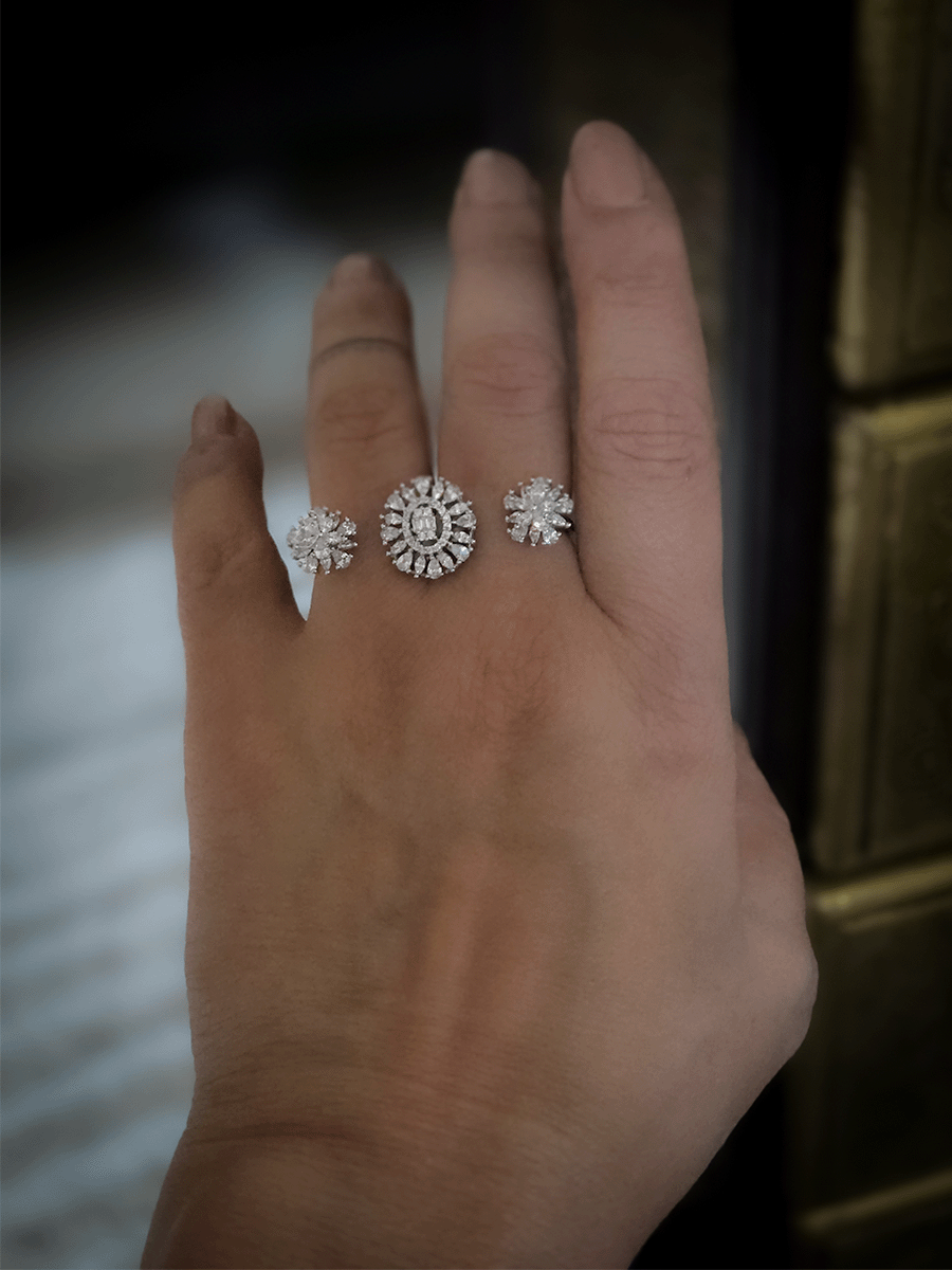 Double finger zircon studded three flower design adjustable ring