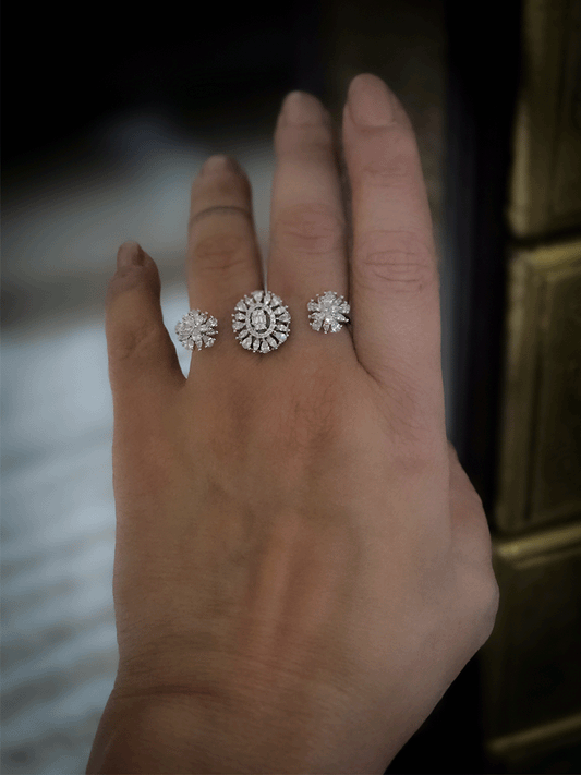 Double finger zircon studded three flower design adjustable ring