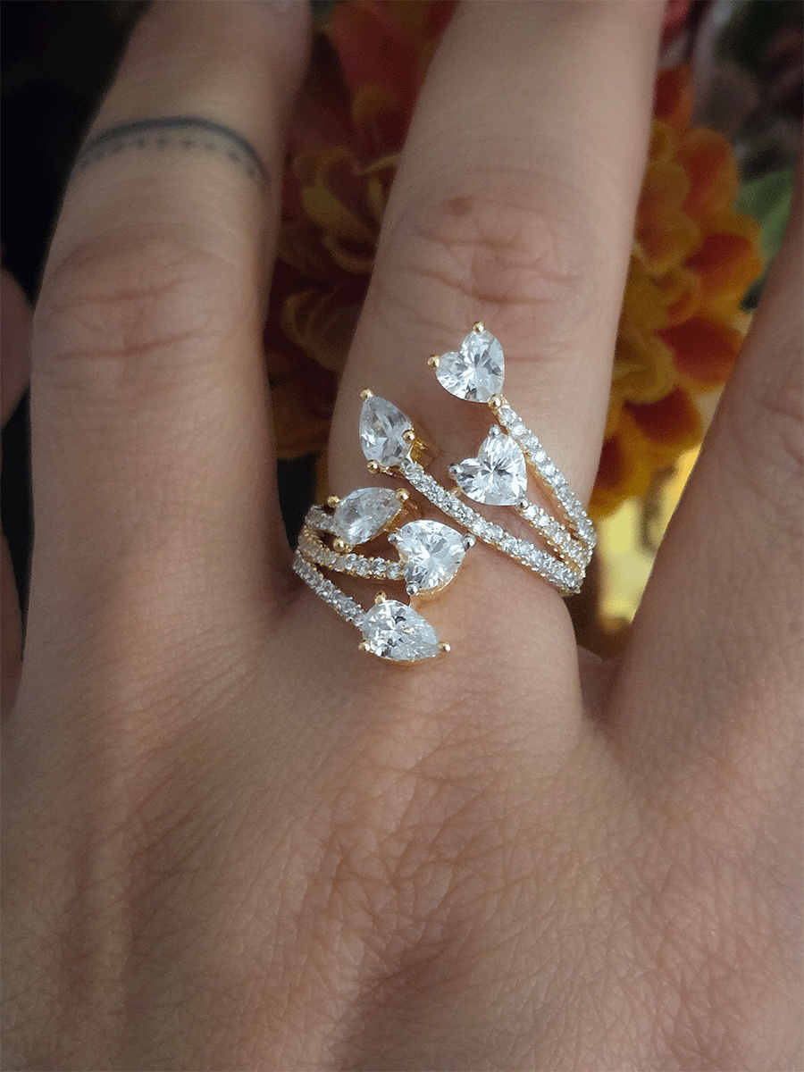Zircon studded adjustable ring with heart and tear drop shaped white stones