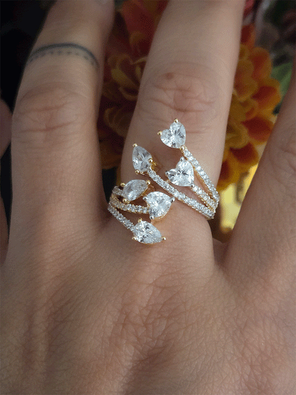 Zircon studded adjustable ring with heart and tear drop shaped white stones