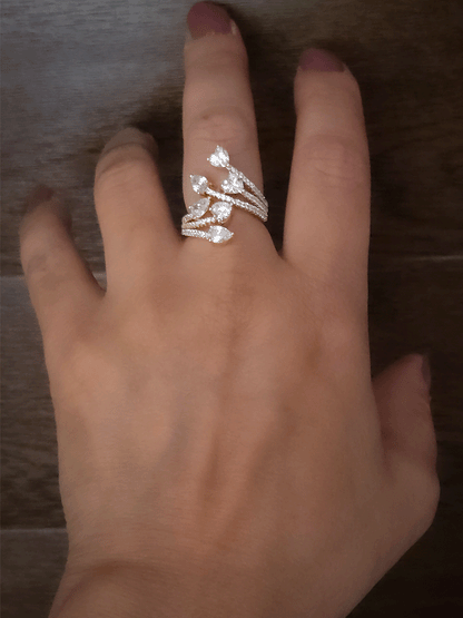 Zircon studded adjustable ring with heart and tear drop shaped white stones