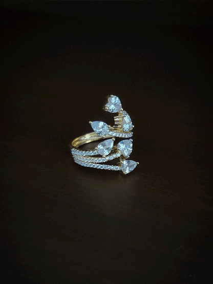 Zircon studded adjustable ring with heart and tear drop shaped white stones