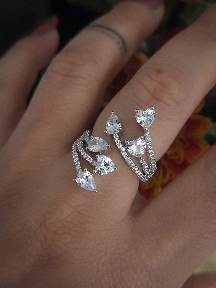 Zircon studded adjustable ring with heart and tear drop shaped white stones