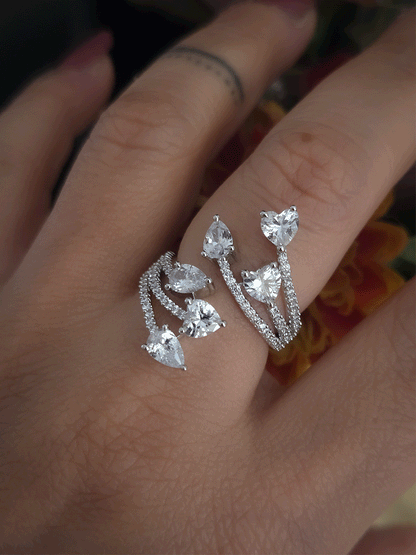 Zircon studded adjustable ring with heart and tear drop shaped white stones