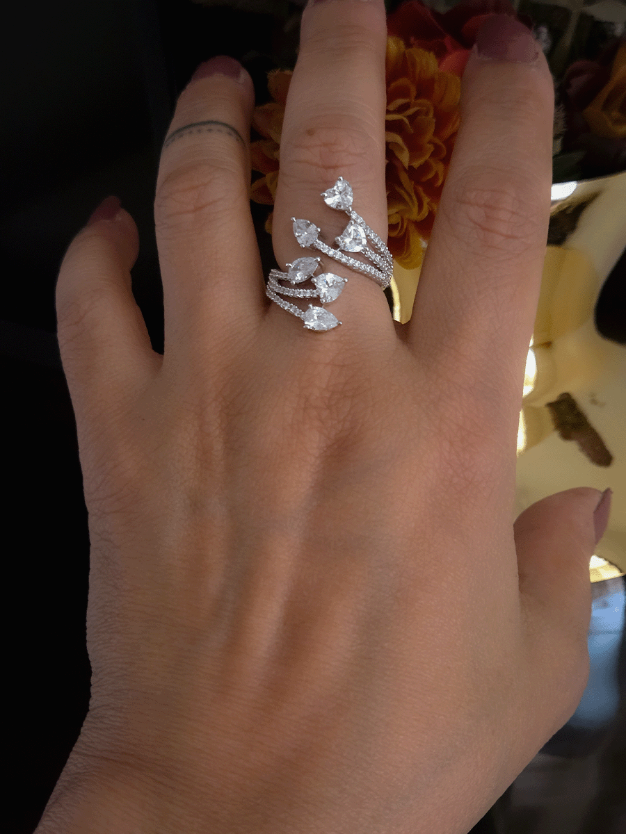 Zircon studded adjustable ring with heart and tear drop shaped white stones