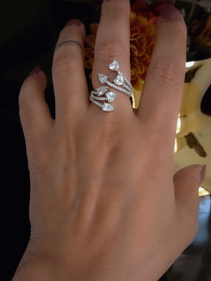 Zircon studded adjustable ring with heart and tear drop shaped white stones