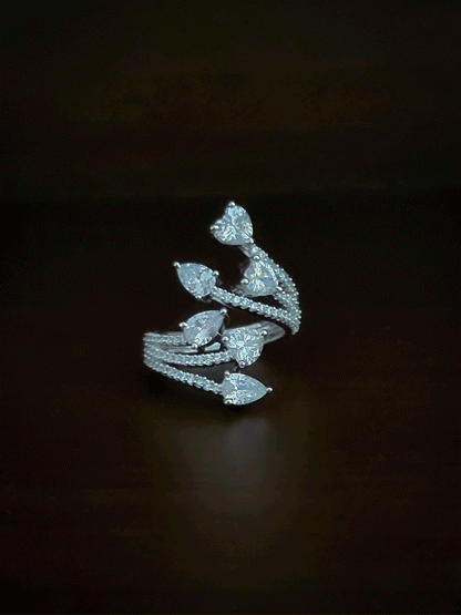Zircon studded adjustable ring with heart and tear drop shaped white stones