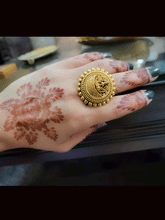 Load image into Gallery viewer, Laxmiji motif in self design circular adjustable ring