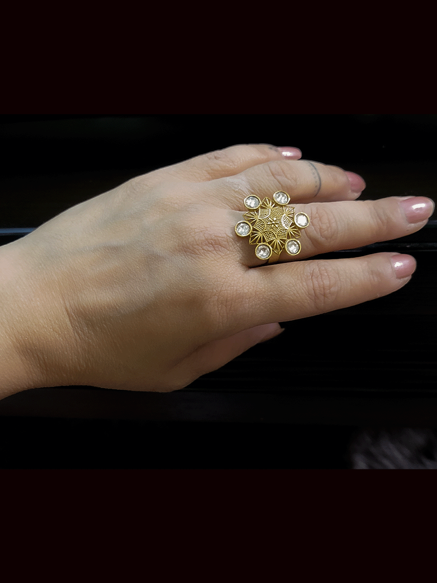 Gold finish kundan studded openable ring with intricate design