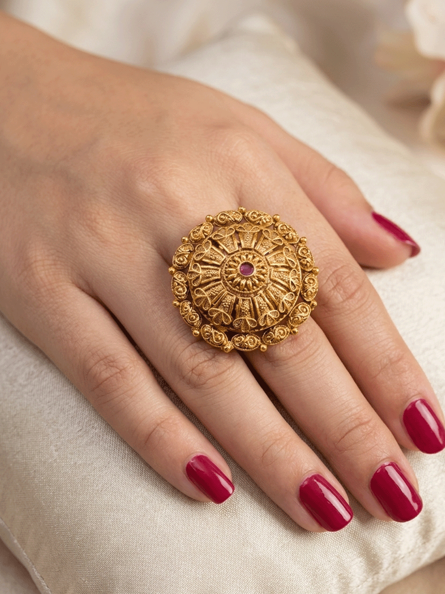 Flower design bold adjustable ring with ruby stone center and oval design outline