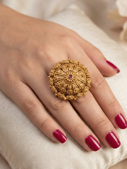 Flower design bold adjustable ring with ruby stone center and oval design outline