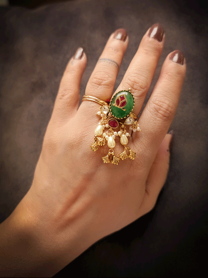 Red stone inlay work on jade stone adjustable ring with pearl and shell design gold bead tassels