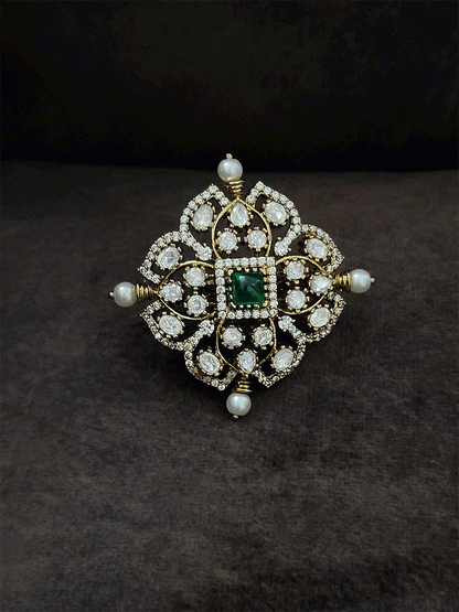 Coloured stone in center of adjustable victorian ring