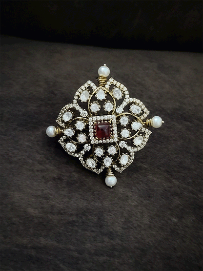 Coloured stone in center of adjustable victorian ring