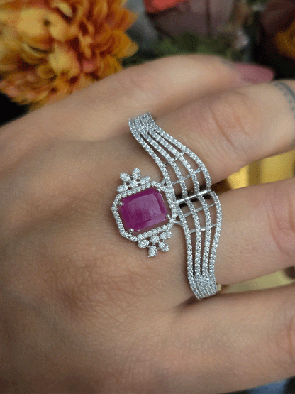 Zircon studded double finger adjustable ring with rectangular coloured stone in center