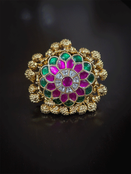 Green and pink paachi kundan adjustable ring with flower engraved ghunghru hangings