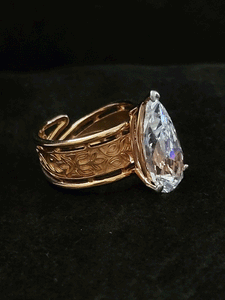 Rosegold finish self design long leaf shaped white stone adjustable ring