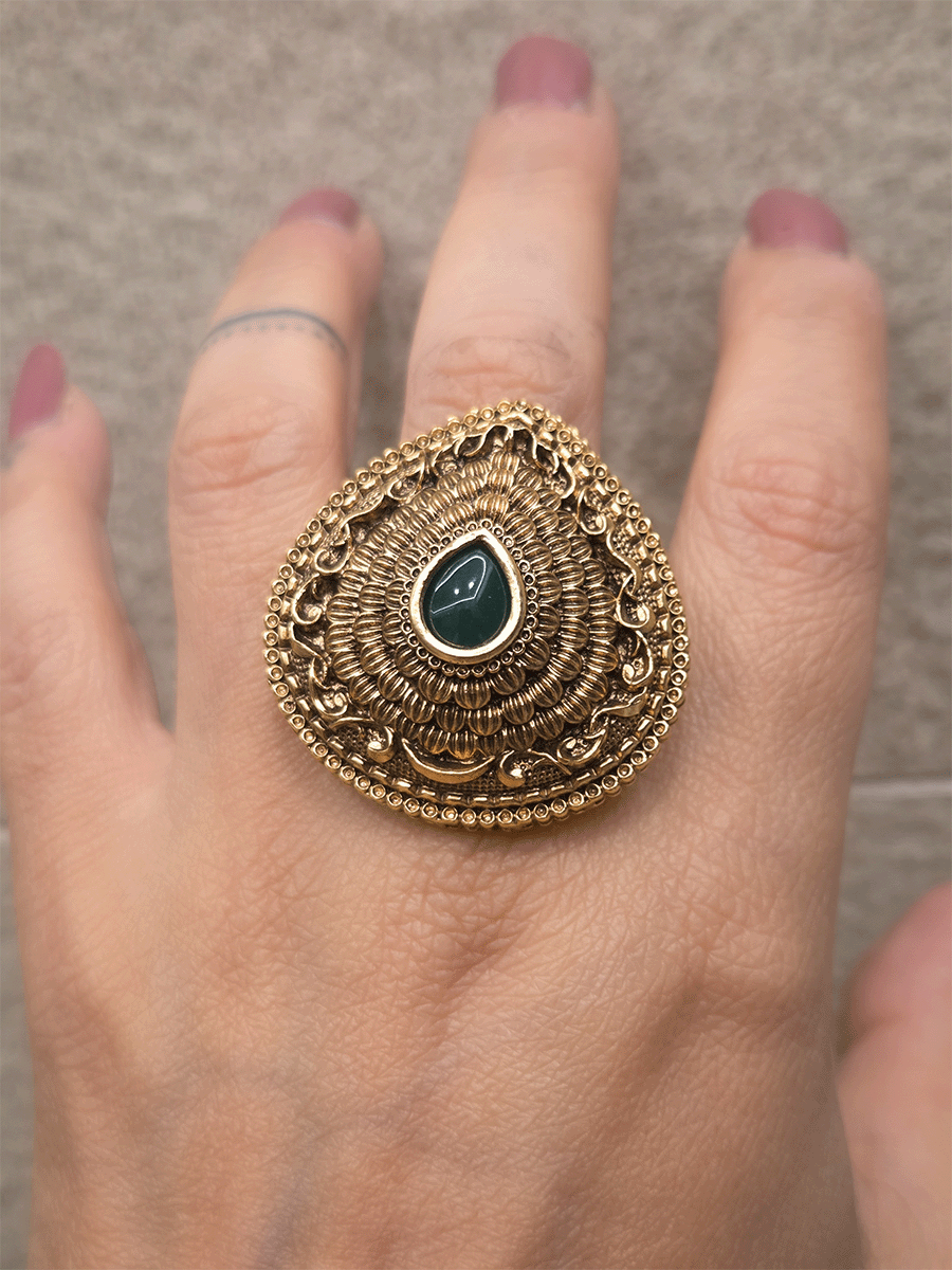 Antique gold finish openable self design leaf shaped tear drop center stone ring