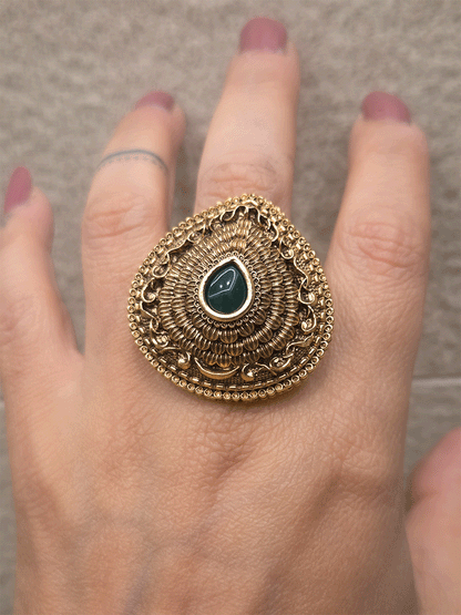 Antique gold finish openable self design leaf shaped tear drop center stone ring