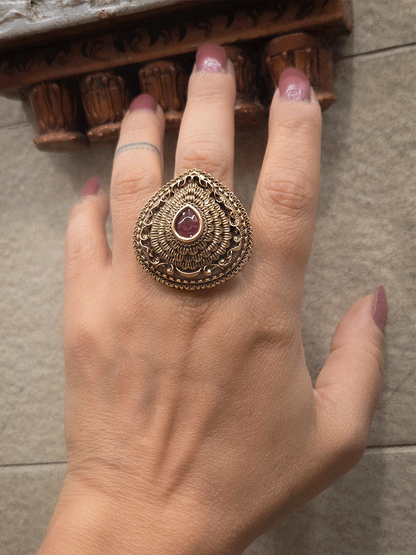 Antique gold finish openable self design leaf shaped tear drop center stone ring