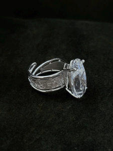 Oval shaped white stone adjustable ring with self design broad band