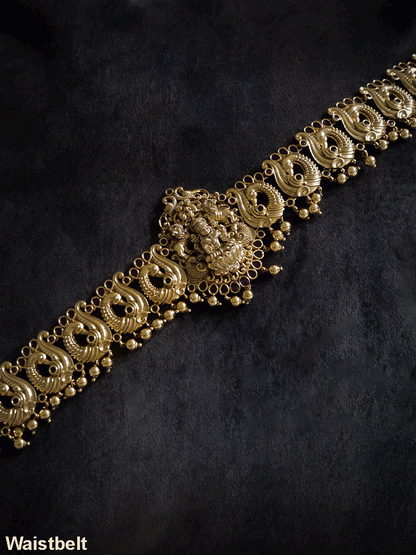 Laxmiji motif in center on peacock side design waist belt with gold bead hangings
