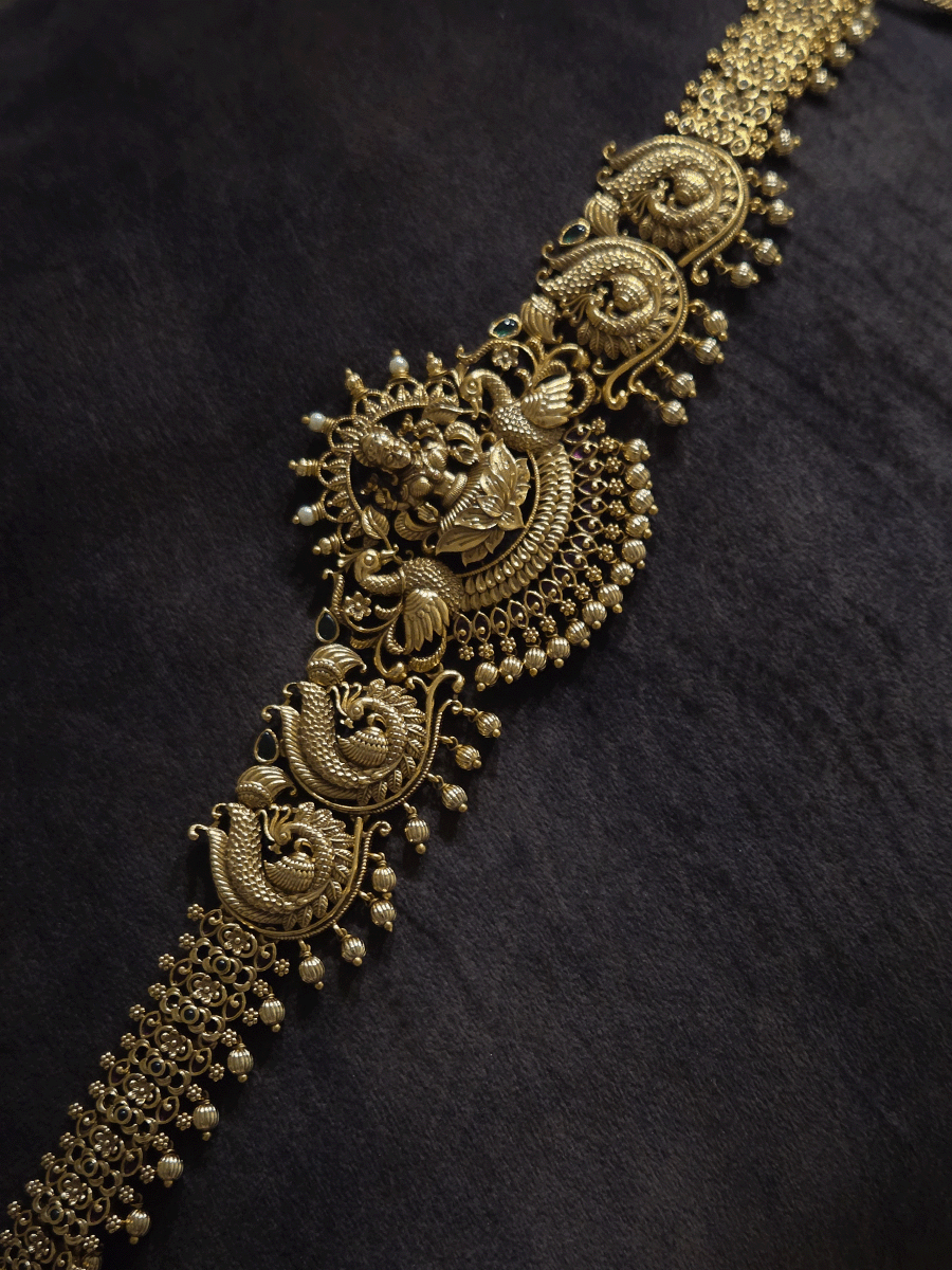 Laxmiji motif in center with peacock on both sides waist belt with peacock design chain