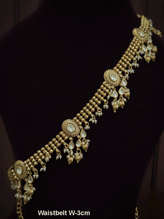 Kundan center oval tukdi with kundan hangings broad chain waist belt