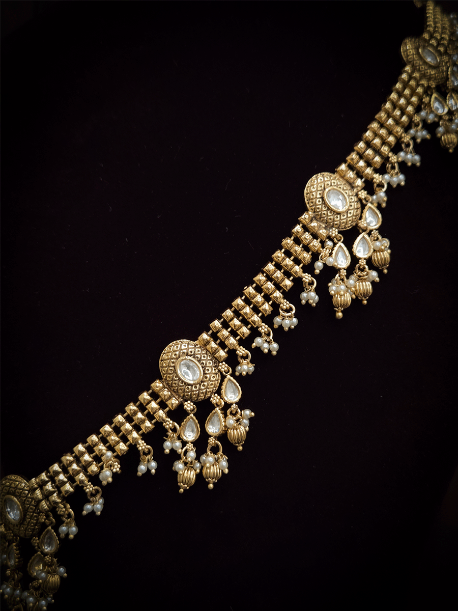Kundan center oval tukdi with kundan hangings broad chain waist belt