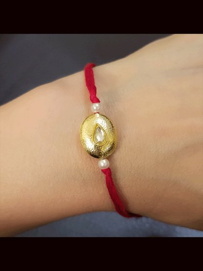 Set of three coloured thread gold bead rakhi's with kundan in the center(Set of 3 rakhi's)