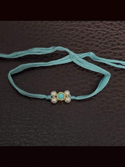 Round stone with side white bead design small rakhi