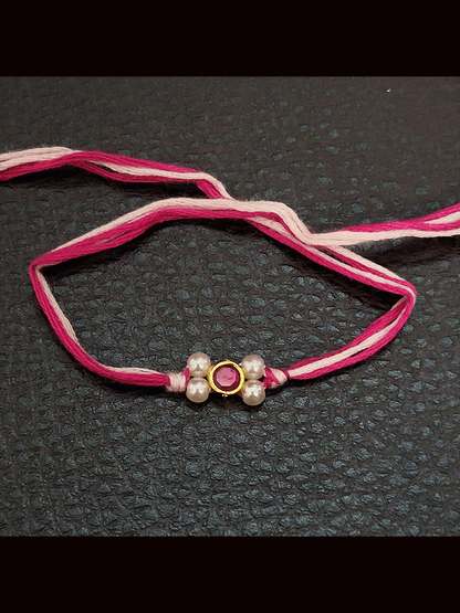 Round stone with side white bead design small rakhi