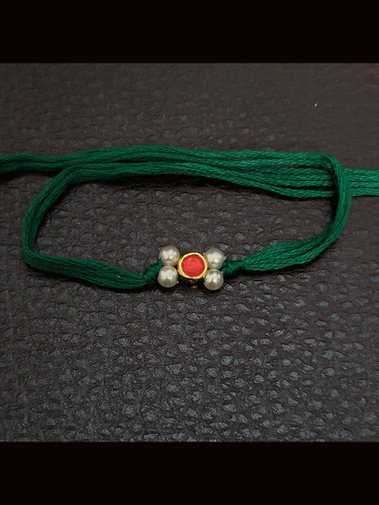 Round stone with side white bead design small rakhi