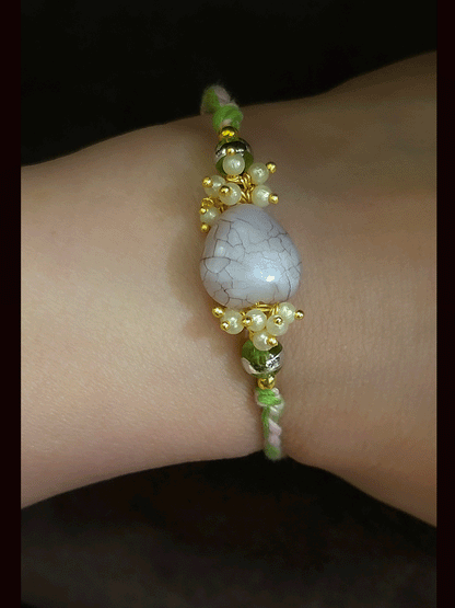 Textured white stone with side pearly cluster beads bhai rakhi