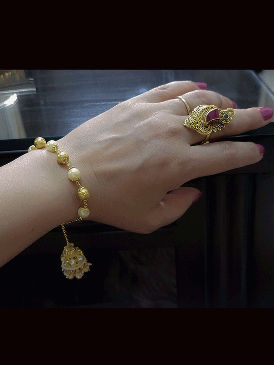 Alternate pearl and gold bead sister and bhabhi rakhi with hanging  kundan jhoomki