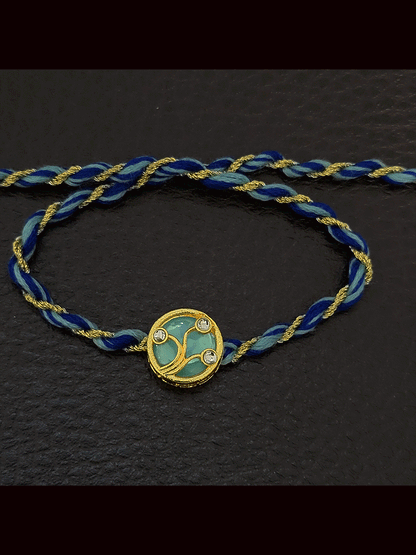 Round(1.5cm) coloured Kundan work with coloured thread rakhi
