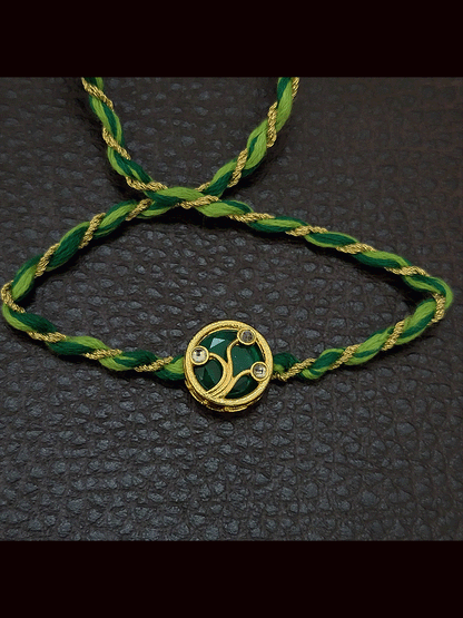 Round(1.5cm) coloured Kundan work with coloured thread rakhi