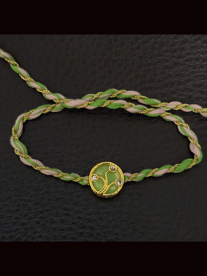 Round(1.5cm) coloured Kundan work with coloured thread rakhi