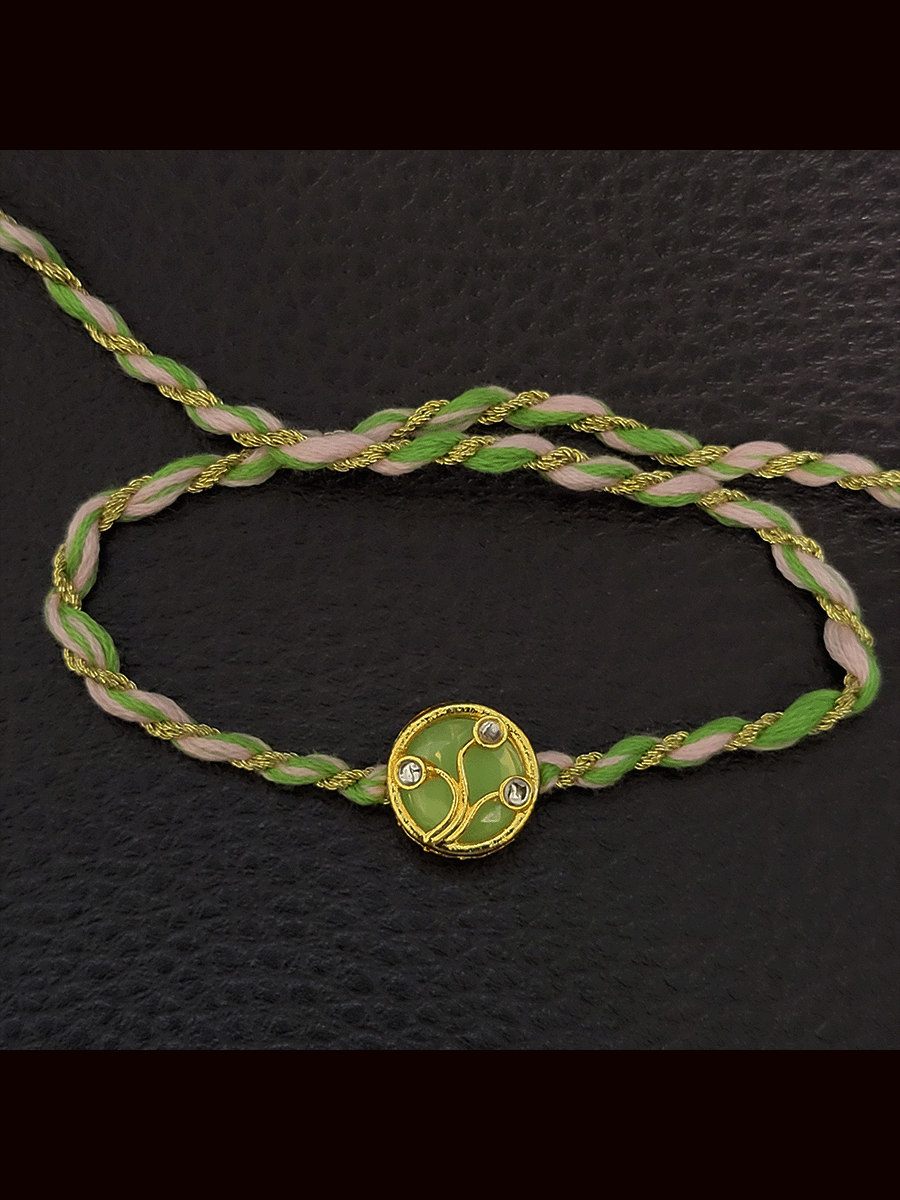 Round(1.5cm) coloured Kundan work with coloured thread rakhi