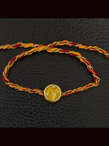 Round(1.5cm) coloured Kundan work with coloured thread rakhi