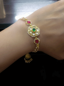 Flower tukdi paachi kundan sister and bhabhi rakhi with jhoomki hanging