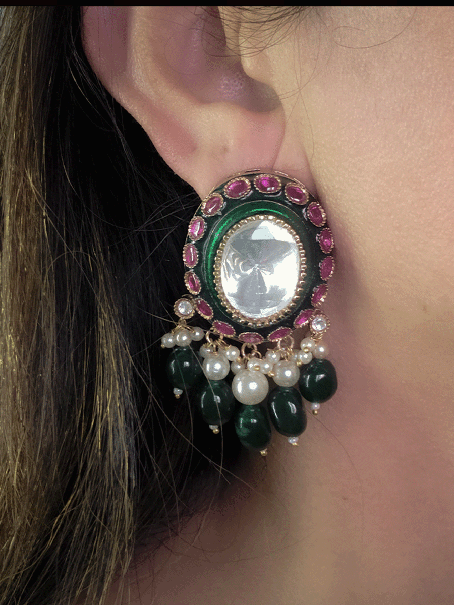 Bold oval uncut polki in center of green enamel choker set with green hanging beads