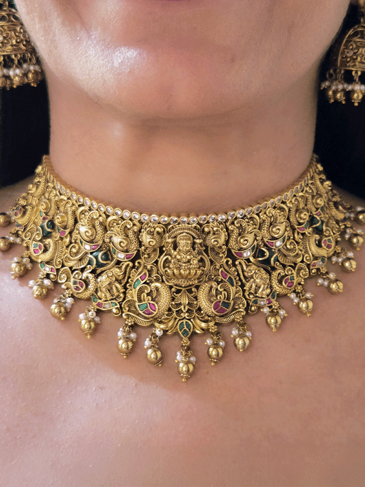 Kundan studded 6cm broad Laxmiji set with elephants and peacocks carving